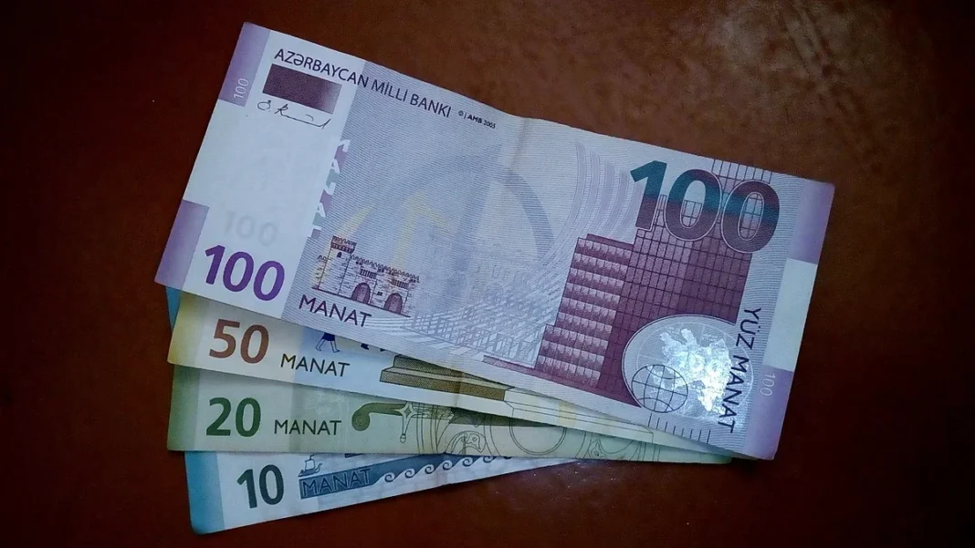 Azerbaijani manat banknotes illustrating the country’s salary forecast through 2030