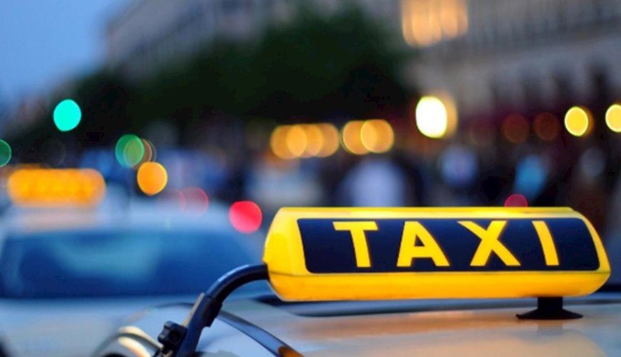 Taxis and traffic on a Baku street
