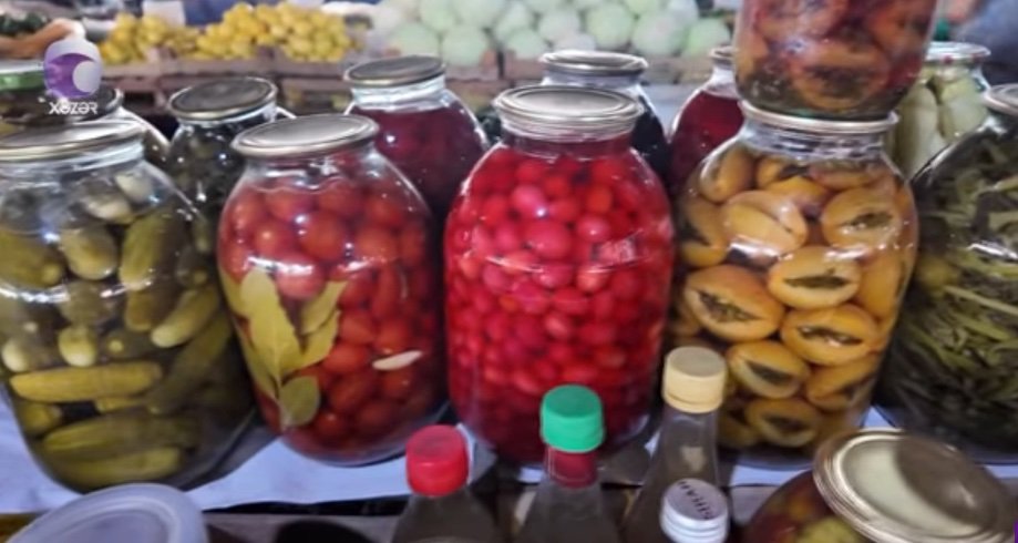 Jars of homemade pickles and preserves offered for sale in Azerbaijan