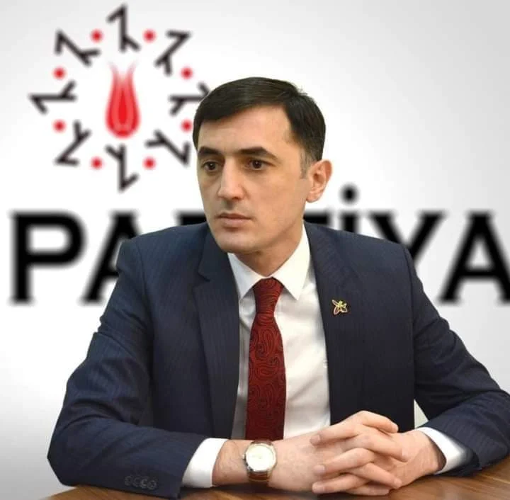 Azerbaijani politician Tural Abbasly speaking during a televised interview