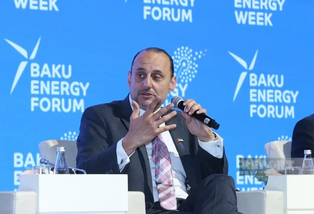 An XRG representative speaks at an energy forum in Baku