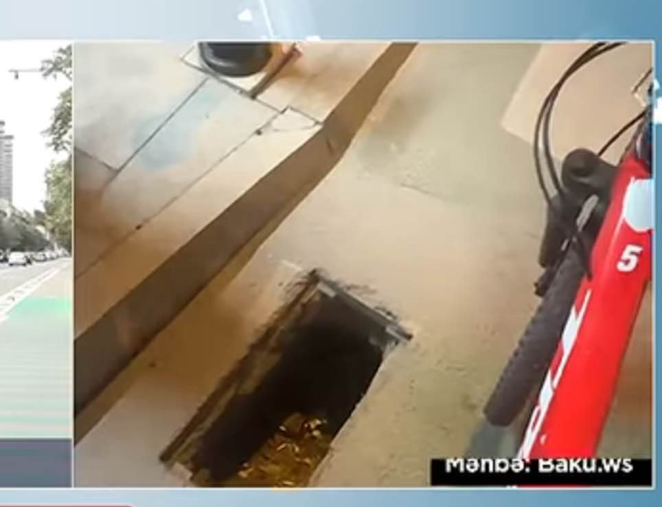 Open storm drain on Afiyaddin Jalilov Street in Baku