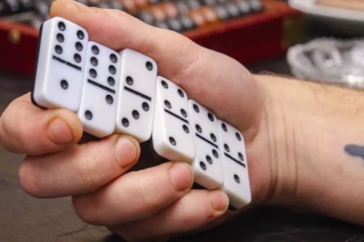 Domino tiles on a table during a cash-stakes game in Goranboy