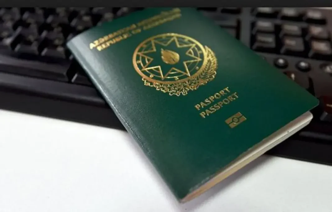 Open passport showing visa and border-stamp pages