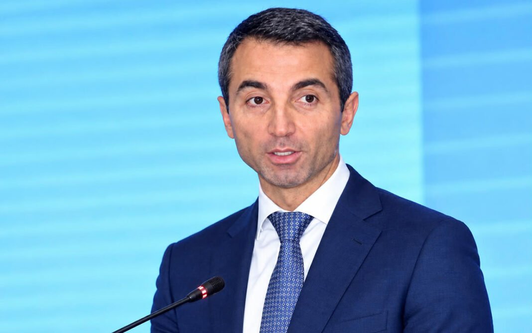 Azerbaijani businessman Adnan Ahmadzada speaks at an event.