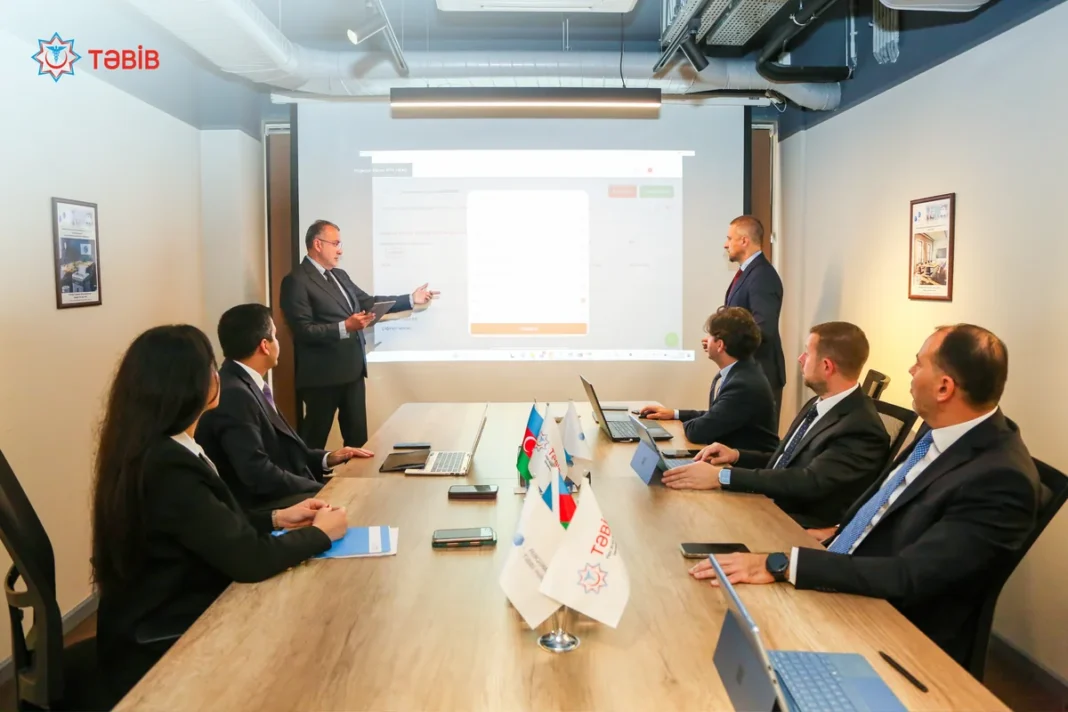 TƏBİB officials review an electronic ambulance dispatch system