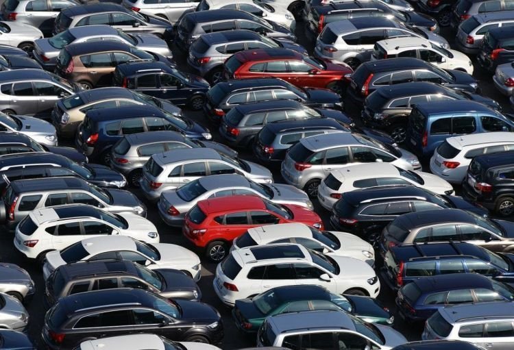 Cars displayed for sale at an auto market