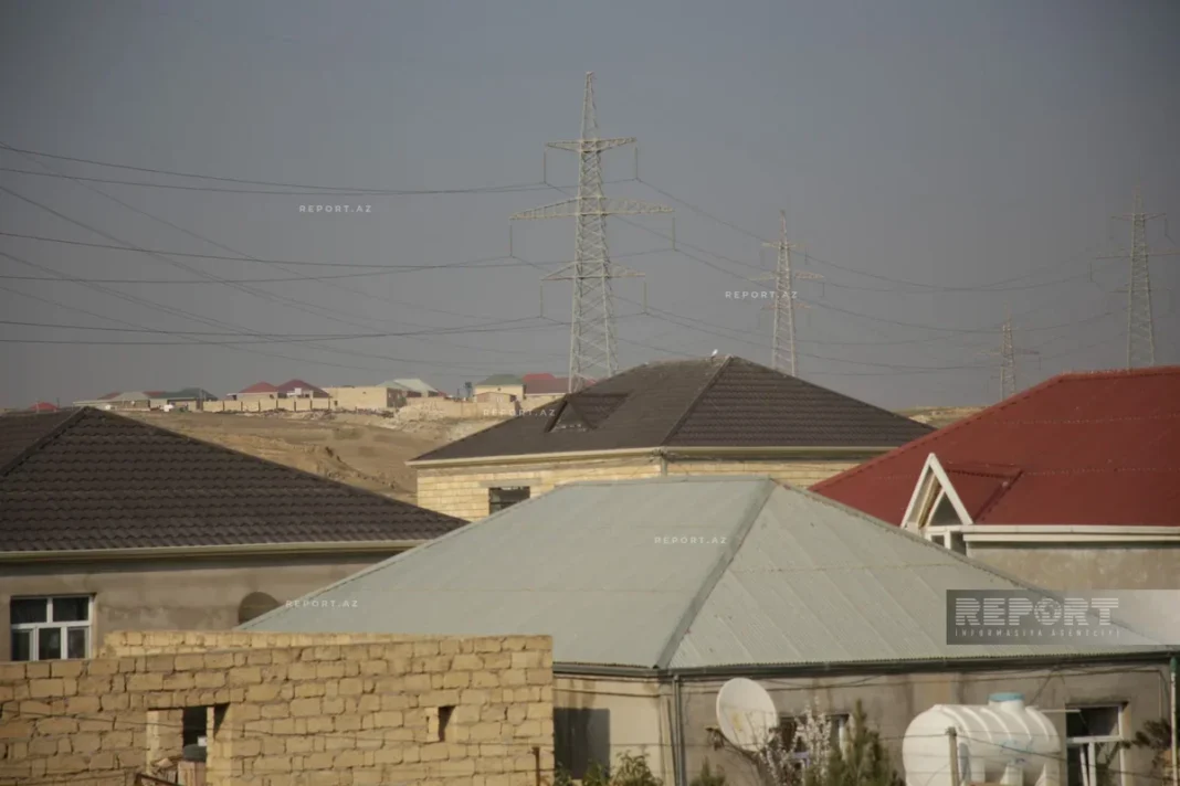 Housing keys against residential buildings in Baku