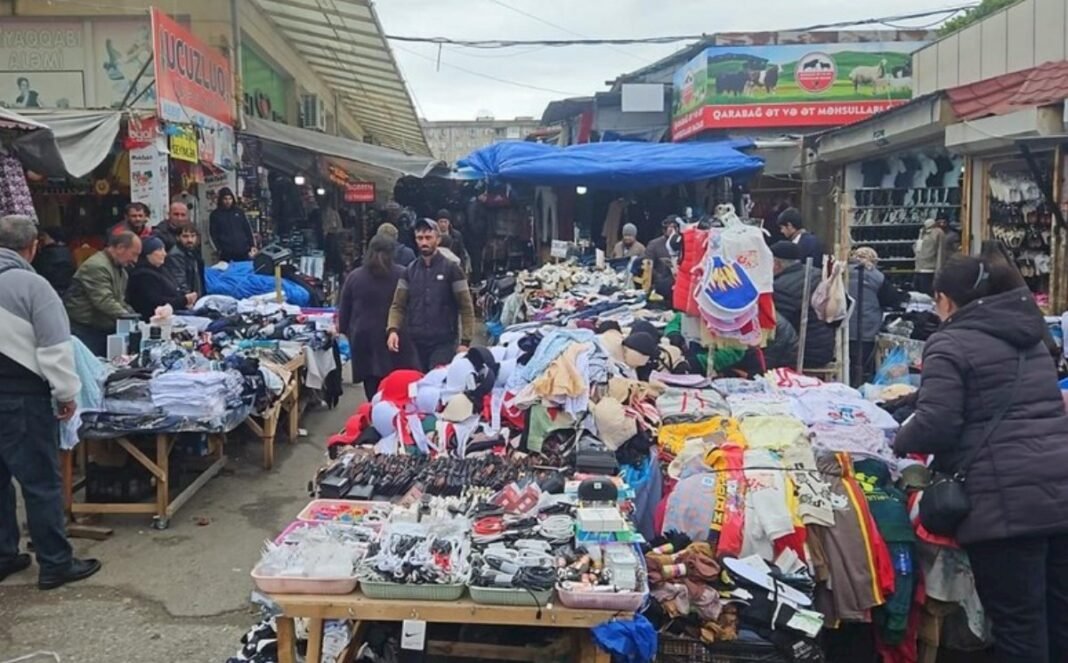 Street vendors and market activity in Baku
