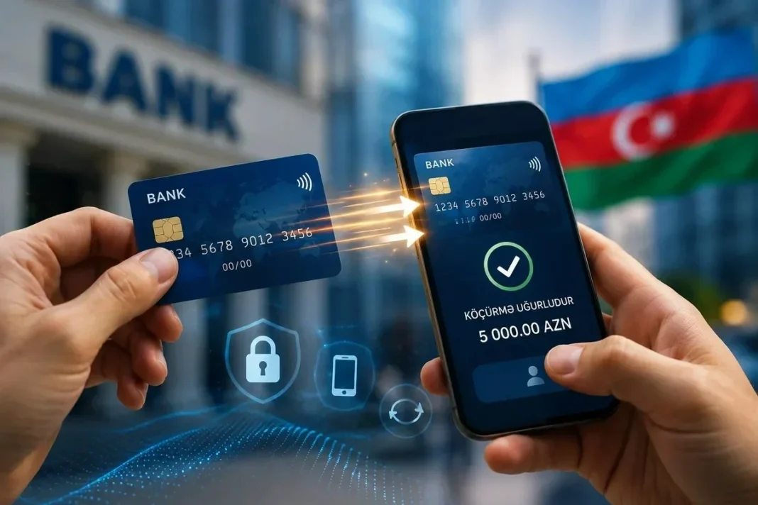 Payment card held near a smartphone for a card-to-card money transfer