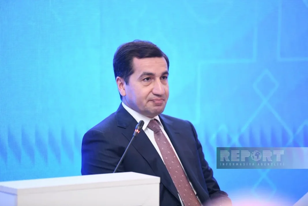 Azerbaijani presidential aide Hikmet Hajiyev speaks at a session in Baku
