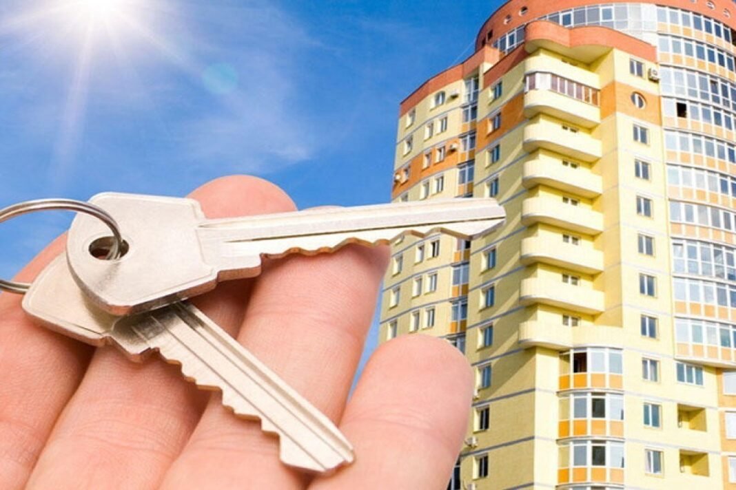 Apartment keys in front of a residential building in Azerbaijan