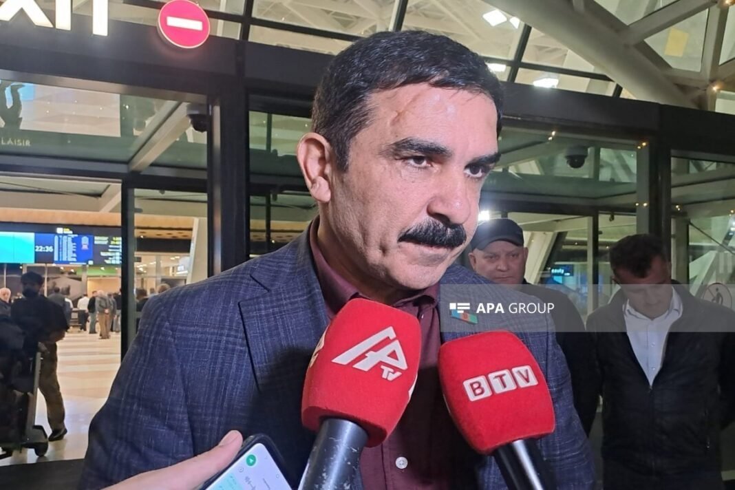 Ibad Huseynov speaking to reporters after returning from Georgia