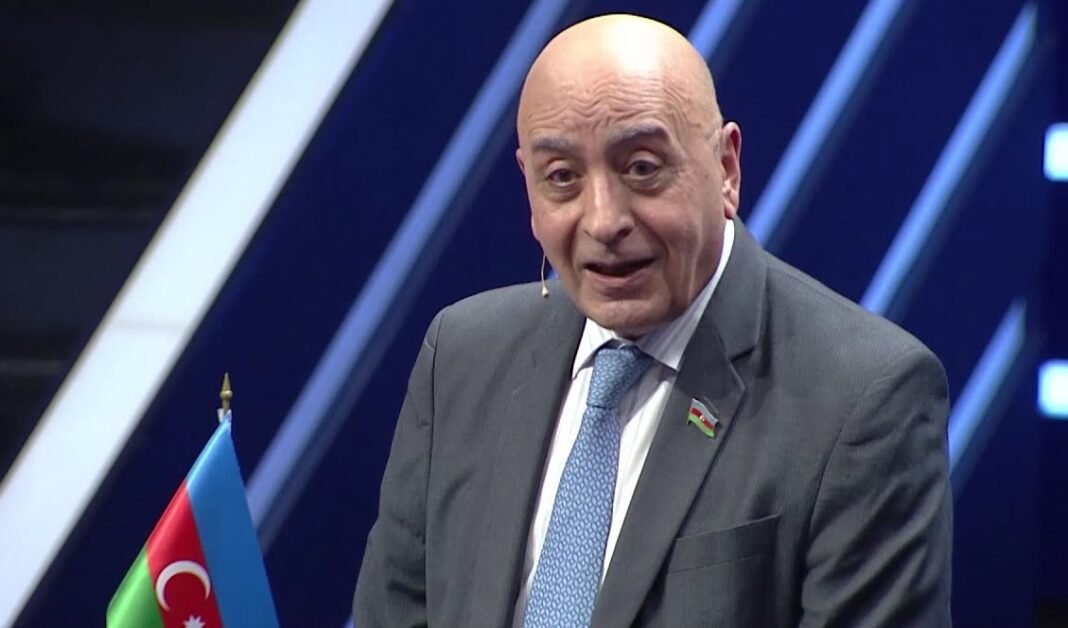 Azerbaijani lawmaker Rasim Musabekov speaking in a television studio