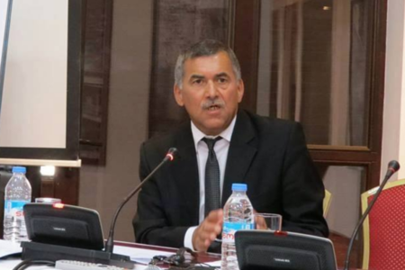 Azerbaijani political analyst Rauf Rajabov speaking at a conference