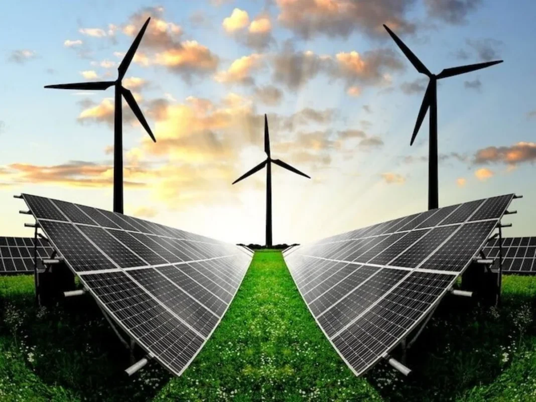 Solar panels and wind turbines. Illustrative image.