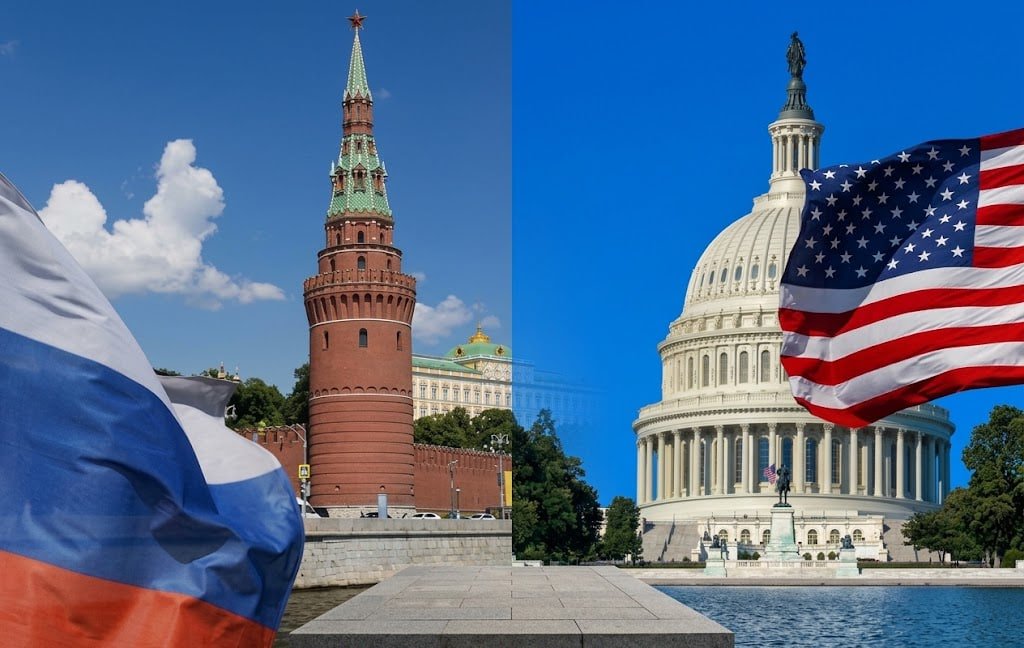 Russian and U.S. flags displayed with the Kremlin and U.S. Capitol